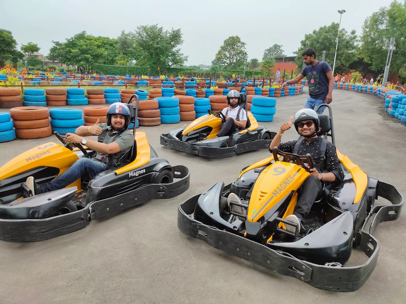 Friends go-karting on the outdoor track