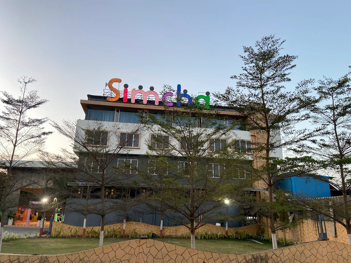 Simcha resort building at dusk