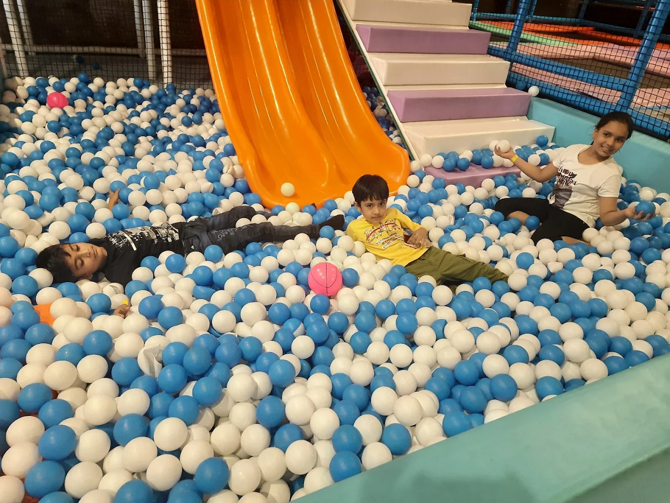 Children playing in the ball pit